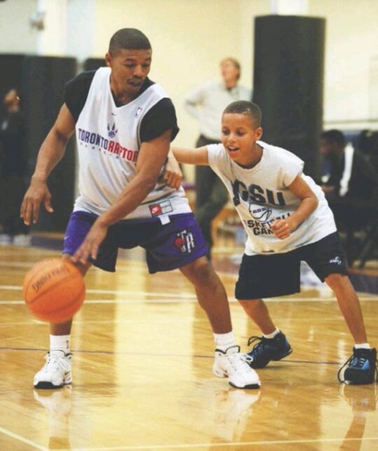 mugsy and steph curry 540x644 - Feature: Muggsy Bogues- The Most Unlikely NBA Player EVER